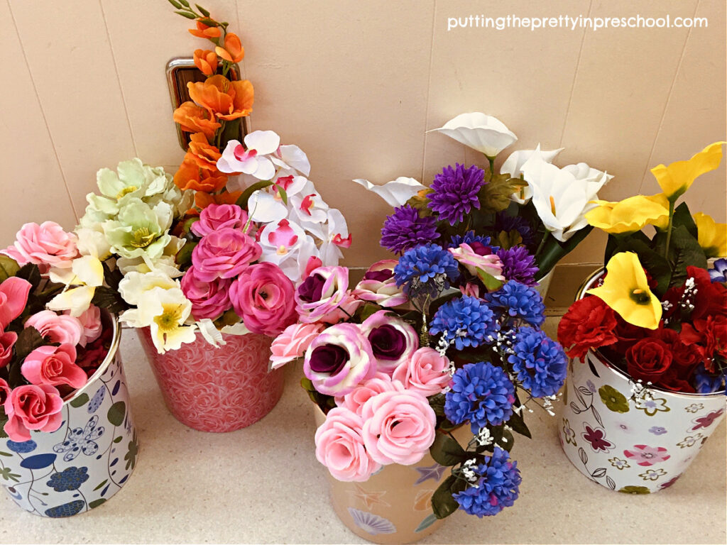These artificial flowers can be arranged by color in a flower stand dramatic play center.