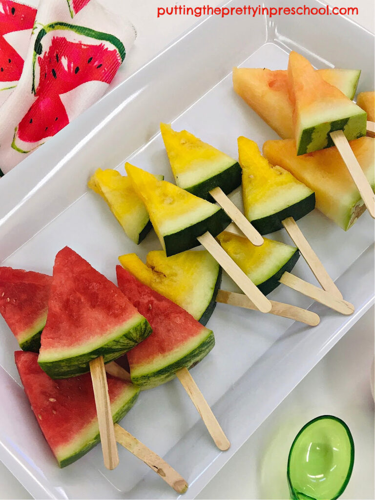 Juicy watermelon popsicles using orange, yellow, and red watermelon add fun and sensory opportunities to snack time.