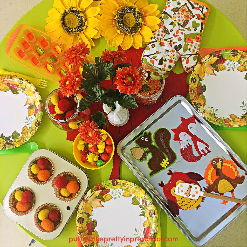 Seasonal loose parts are the highlight of this fun fall tablescape pretend play setup. Imaginative play is sure to happen!