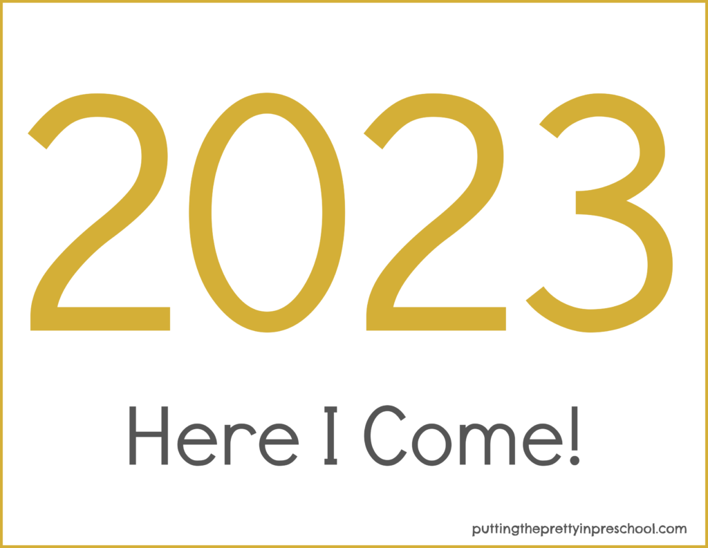 Download this free New Year 2023 gold-numbered printable for making children's keepsake crafts.
