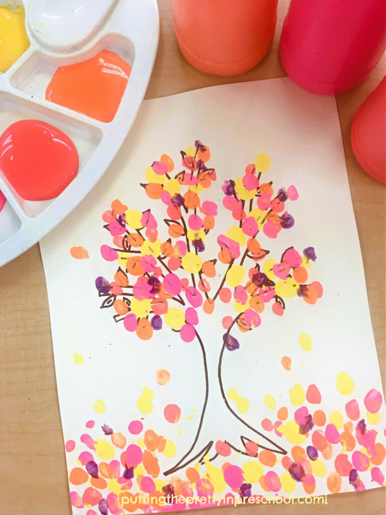 A beautiful, picture-book-inspired neon fingerpaint tree art project the whole family can do. A free tree template is available to download.
