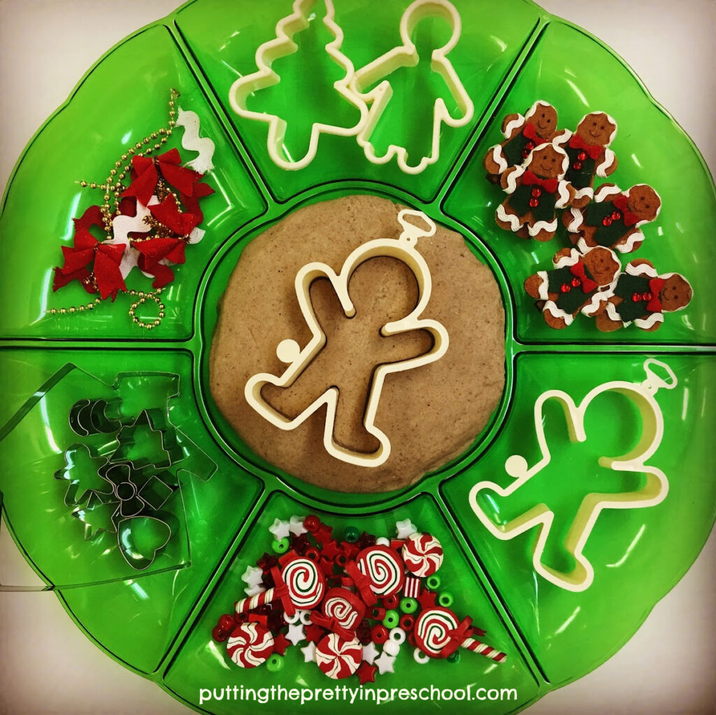 There are many opportunities to be creative with the festive loose parts in this spicy gingerbread playdough invitation your children will love.