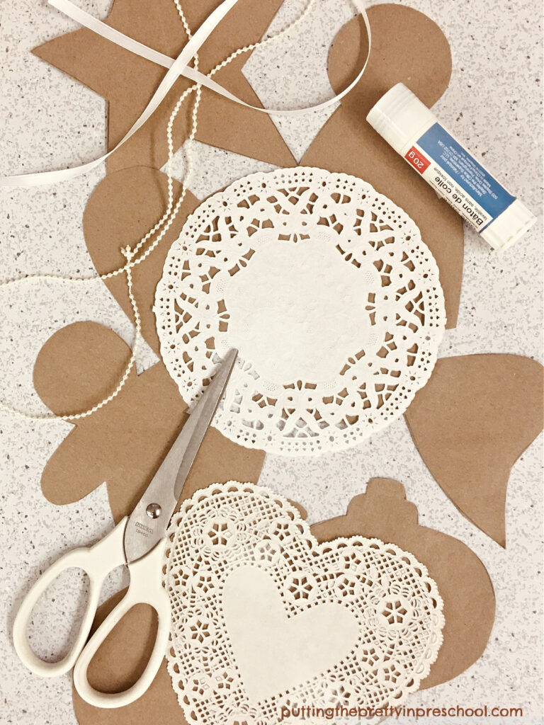 Supplies to make vintage-inspired paper bag Christmas ornaments. Download the free templates for these six different designs.