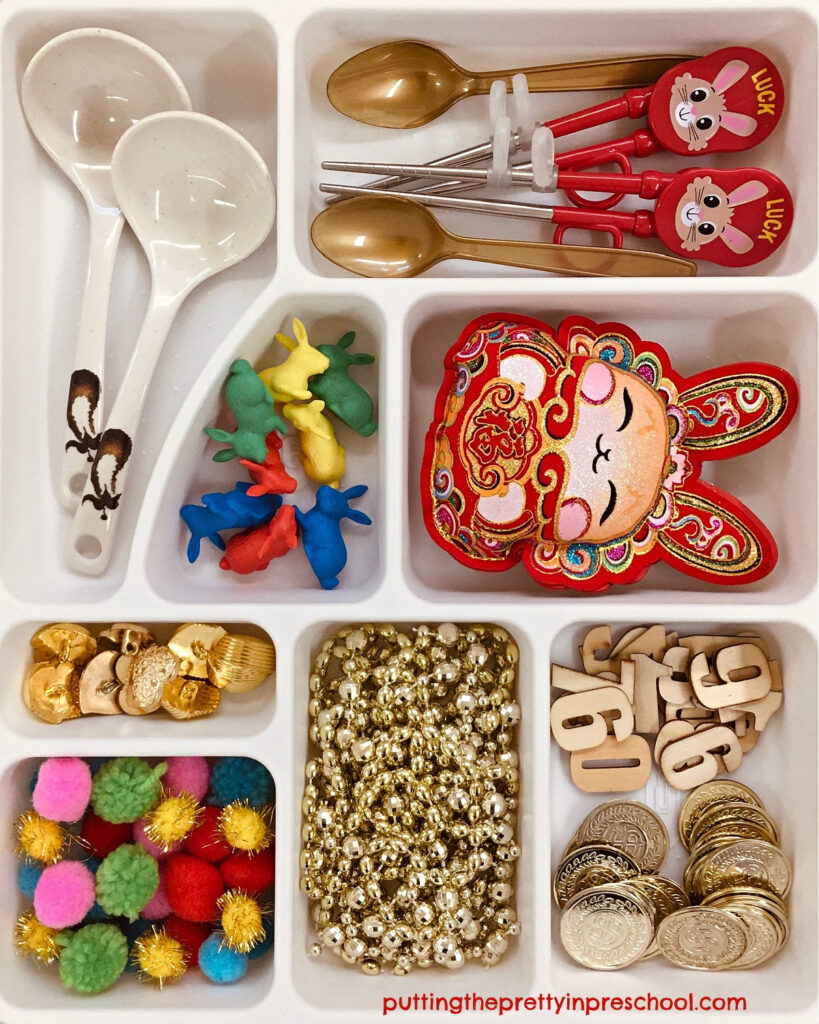 This rabbit-themed Chinese New Year loose parts tray is filled with treasures early learners love to explore.