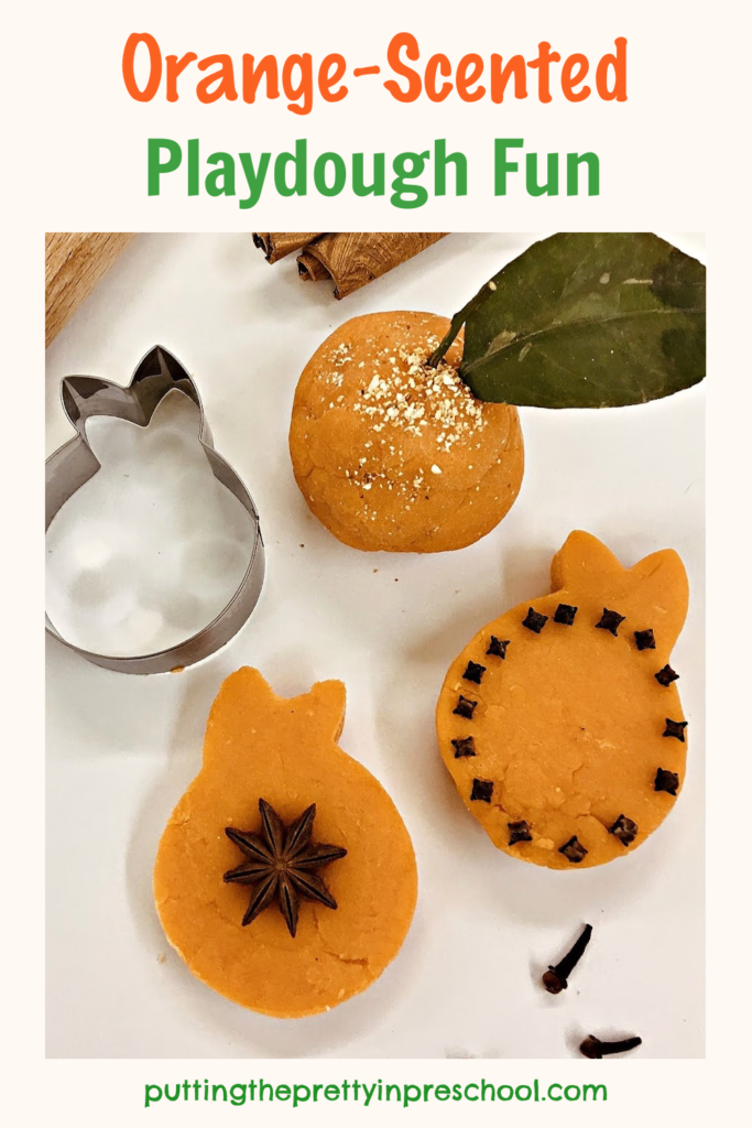 Cinnamon sticks, cloves, and star anise add fun to an orange-scented playdough invitation.