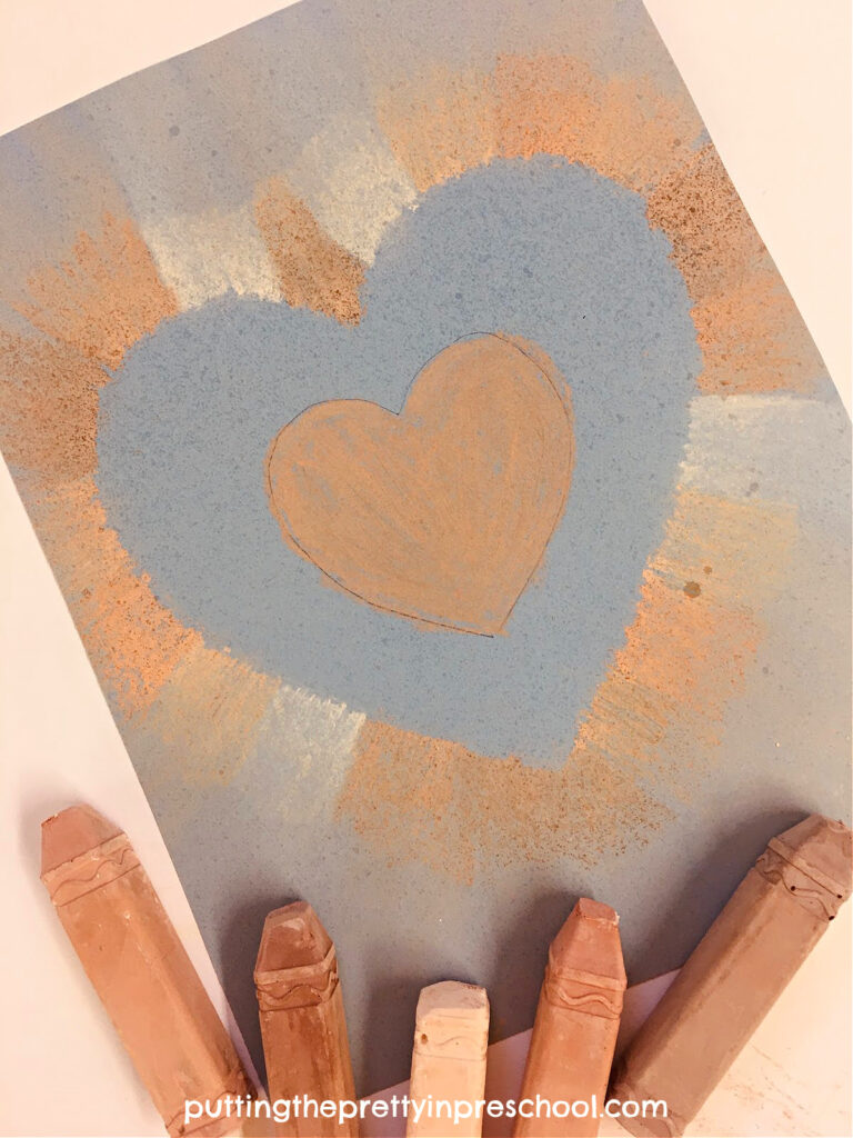 Make a "Celebrate Diversity" heart art project with skin tone sidewalk chalk. An all-ages, stunning art activity.