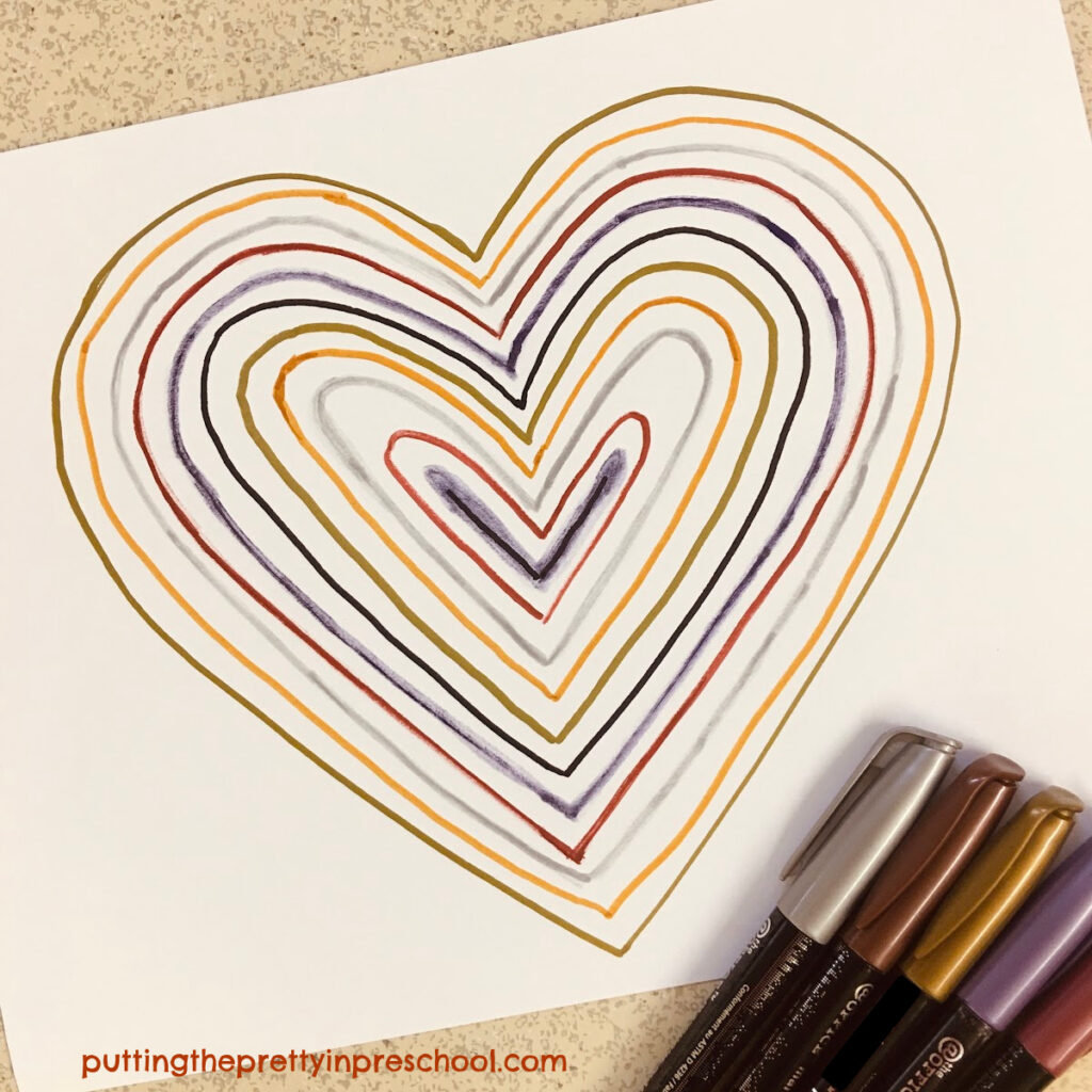 Make a "Celebrate Diversity" heart art project with skin tone metallic markers. An all-ages, non-messy, stunning art activity.