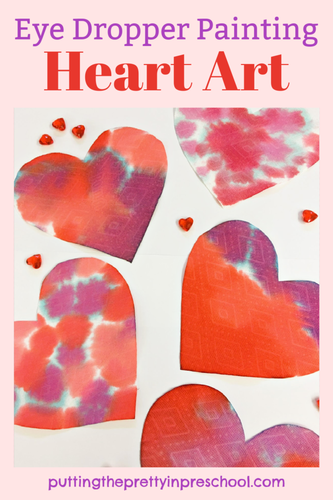 Oh so pretty eye dropper heart art that little learners will love. An easy process art activity for Valentine's Day or any time ot the year.