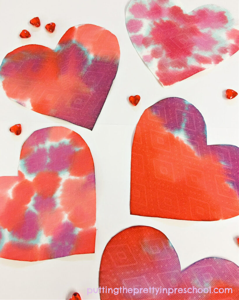 Oh so pretty eye dropper heart art that little learners will love. An easy process art activity for Valentine's Day or any time ot the year.
