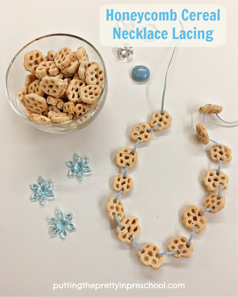 A fun honeycomb cereal "snowflake" necklace lacing activity that is great for fine motor control and eye-hand coordination practice.