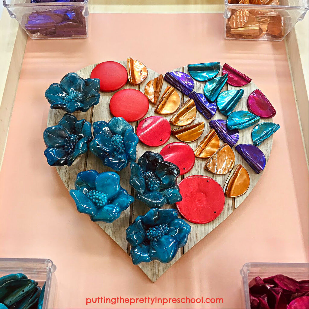 A gorgeous loose-part jewelry heart created with costume jewelry pieces. This is an all-ages transient art project everyone will enjoy.