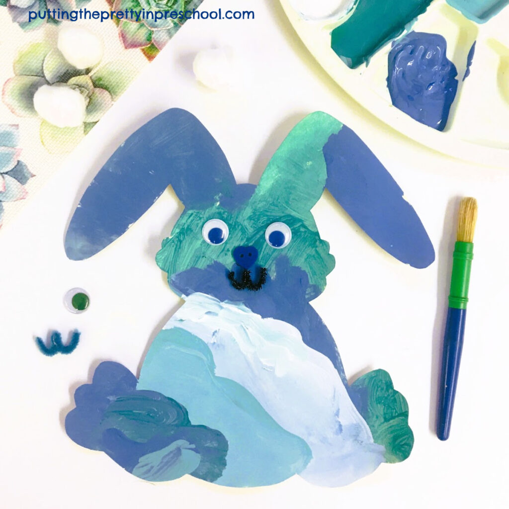 Shades of blue tempera paint are used to decorate this ombre bunny, This is an easy-to-do art project that you are sure to love.