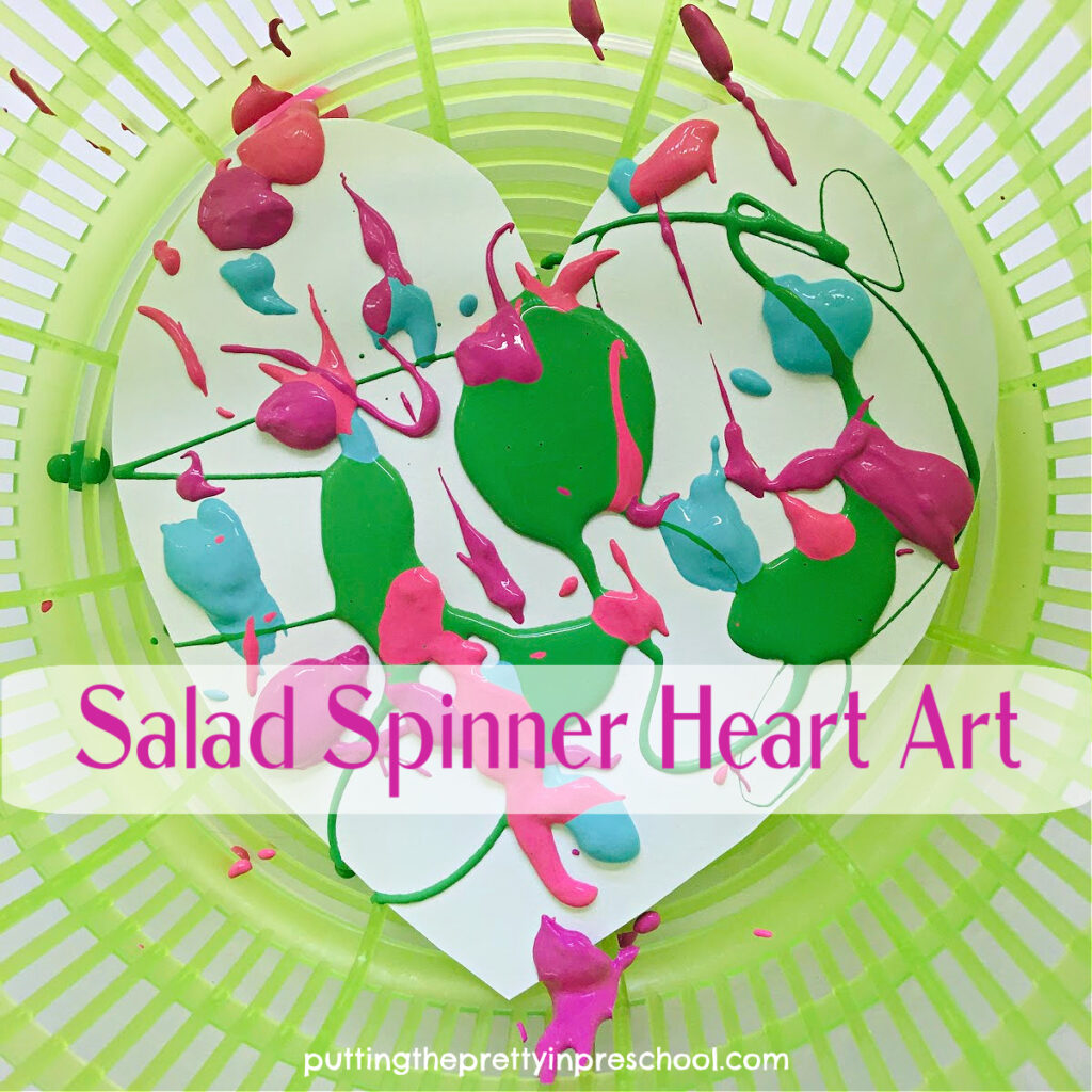 A must-try easy and fun salad spinner heart art activity your little learners will love, This is process art at its best.