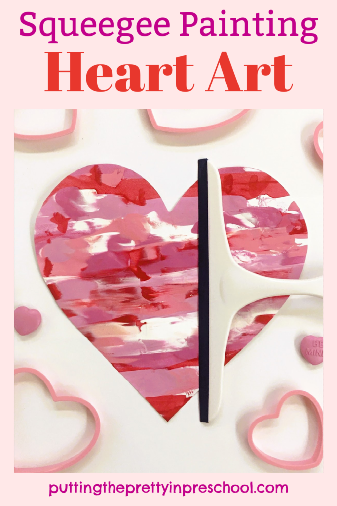 This super fun squeegee painting heart art activity offers participants a chance to spread paint with a squeegee instead of a paintbrush. This is an all-ages process art project.