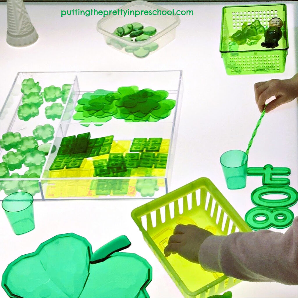 This oh-so-green St. Patrick's Day light table activity filled with transparent loose parts is super fun for early learners to explore.