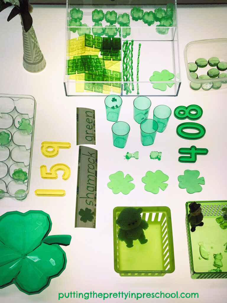 This St. Patrick's Day light table is filled with green transparent loose parts and treasures little learners will love to explore.