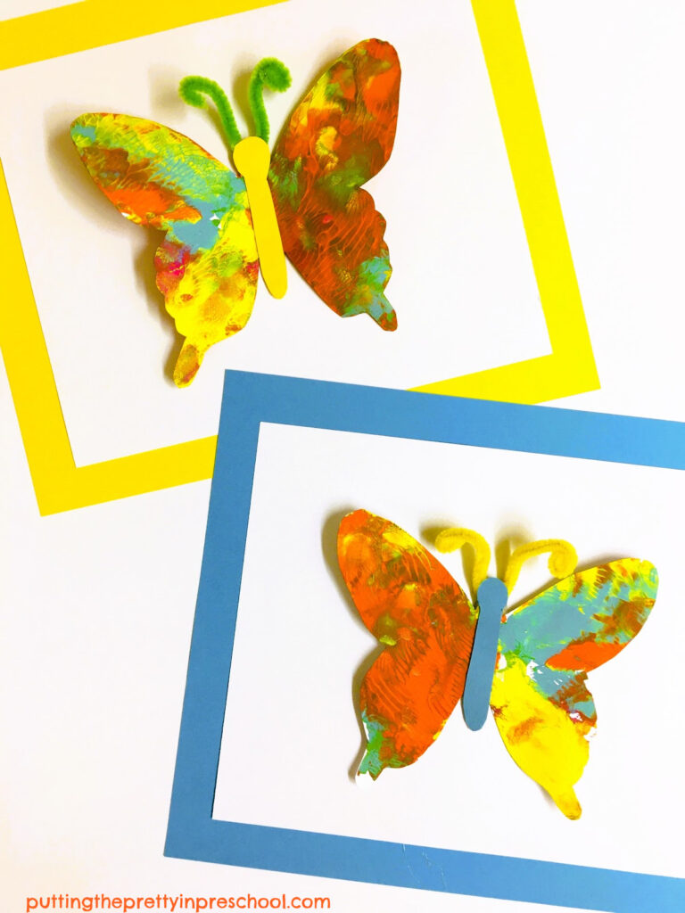 Butterfly paint prints look stunning when displayed on a cardstock background.