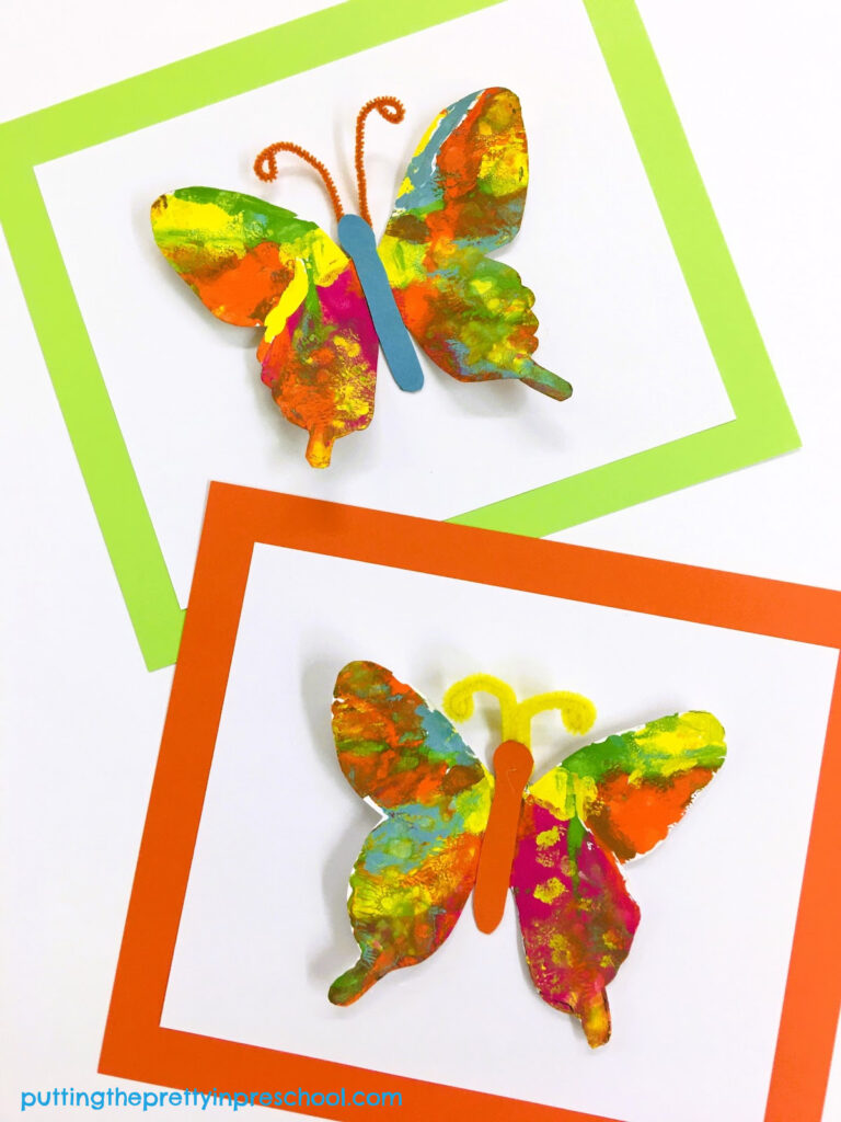Butterfly paint prints look stunning when displayed on a cardstock background.