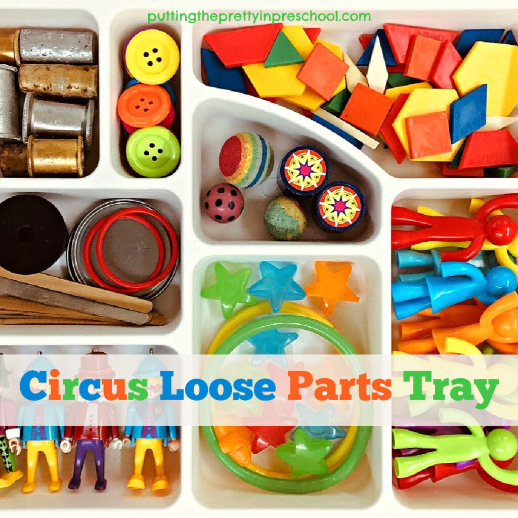 Bright and cheery circus-themed loose parts tray for playdough or small world play.