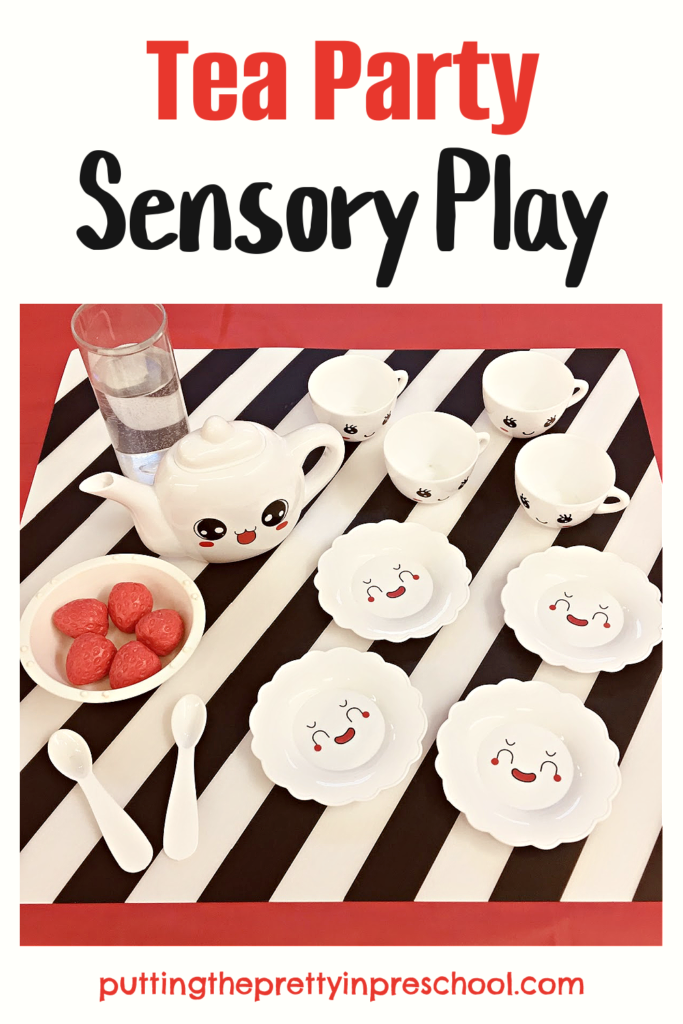 A black, red, and white theme sets the tone for a super inviting tea party water play sensory invitation.