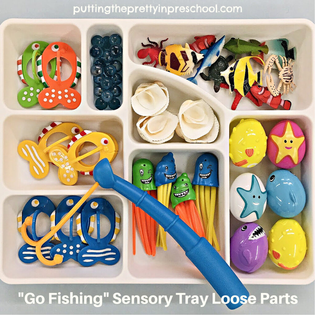 An ocean-themed loose part collection for a super fun "Go Fishing" active world tray. your early learners will love.
