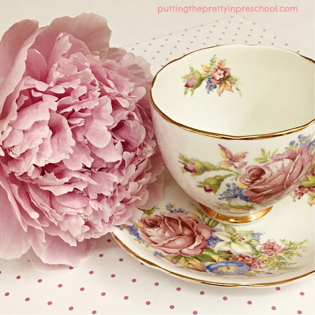 A pretty in pink peony bloom complements a thrifted vintage teacup.