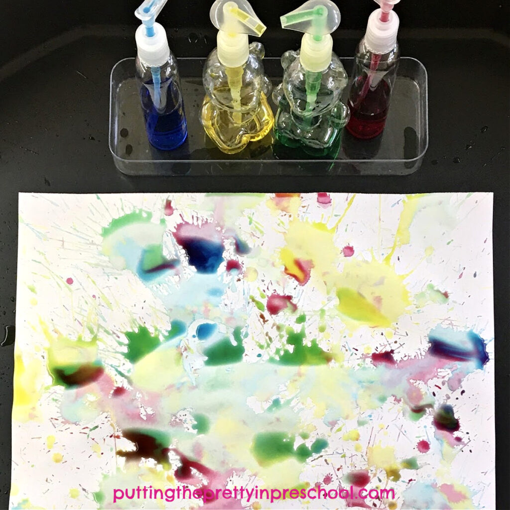 Just a few supplies will get your little learners off and painting in this pump bottle process art activity. A fun, watercolor art project.