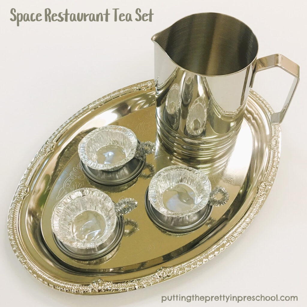 DIY aluminum foil teacups for a space restaurant dramatic play center.