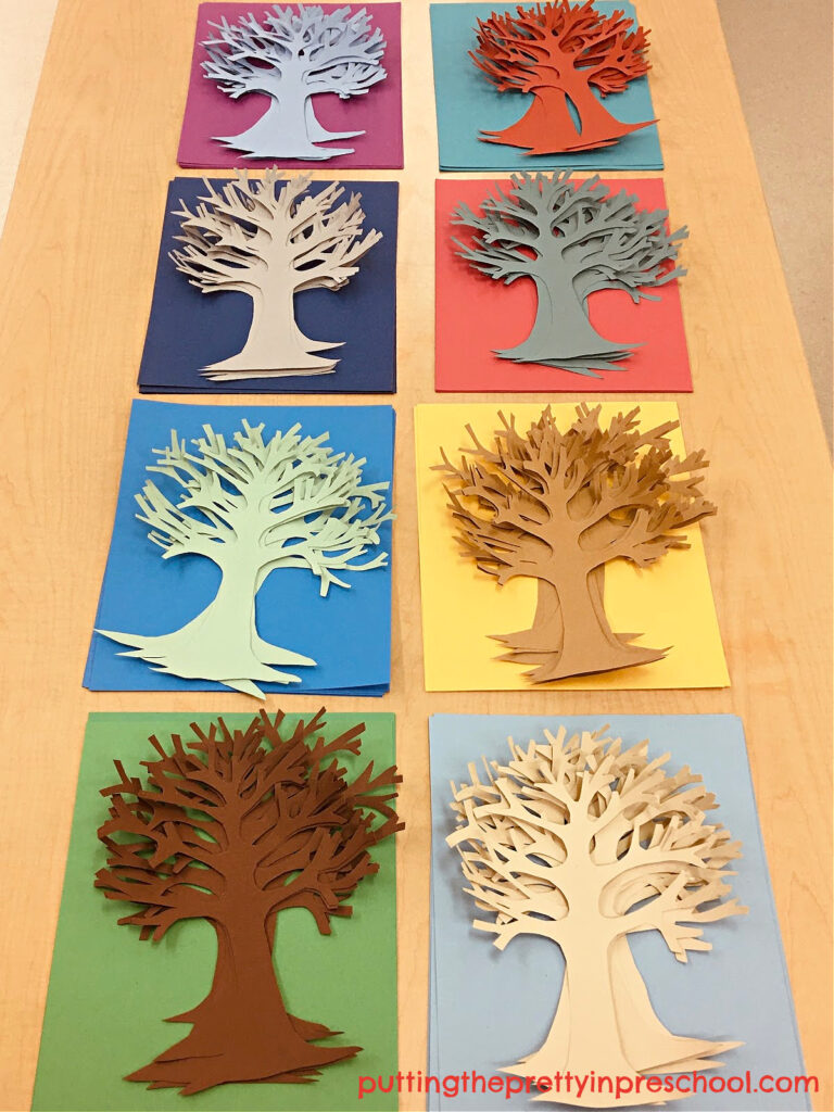 Colored tree trunks prepared for a picture book-inspired tree art bulletin board project. An easy-to do, all ages art activity.