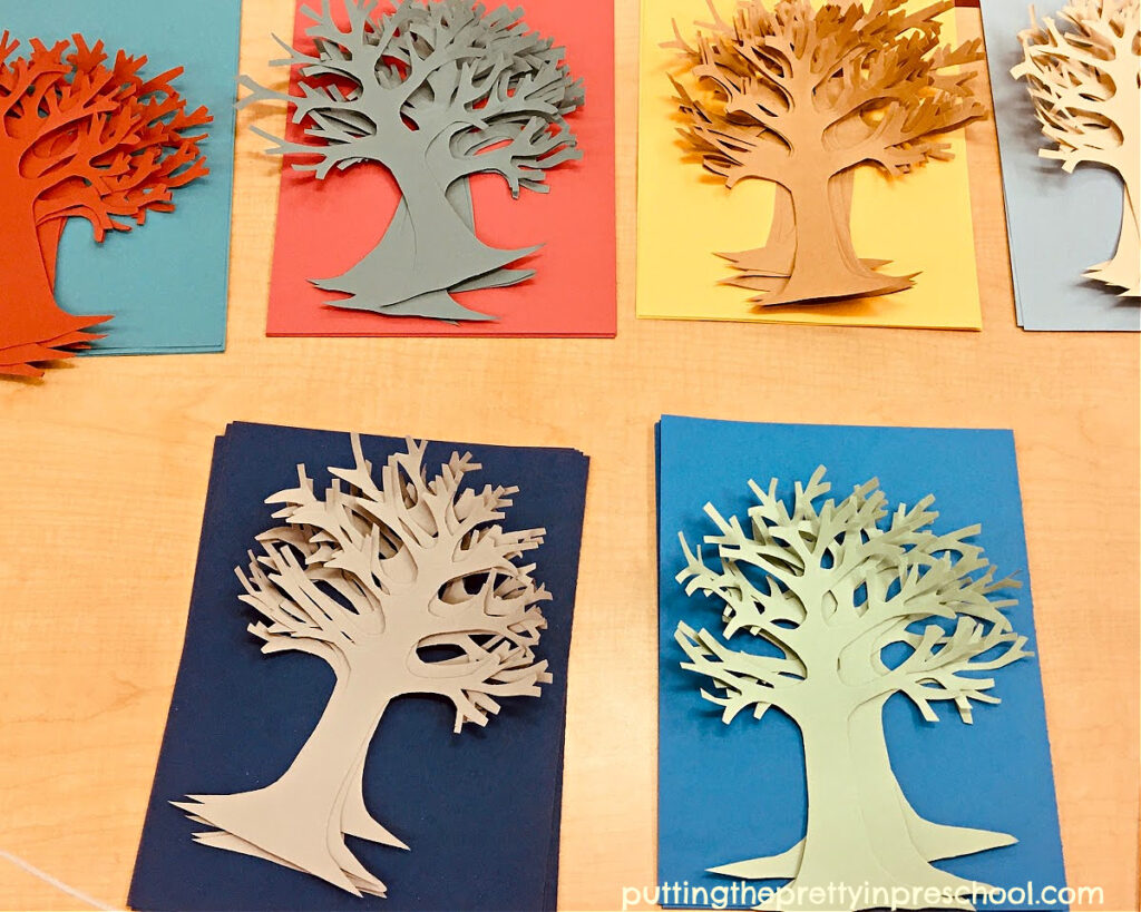 Colored tree trunks prepared for a picture book-inspired tree art bulletin board project. An easy-to do, all ages art activity.