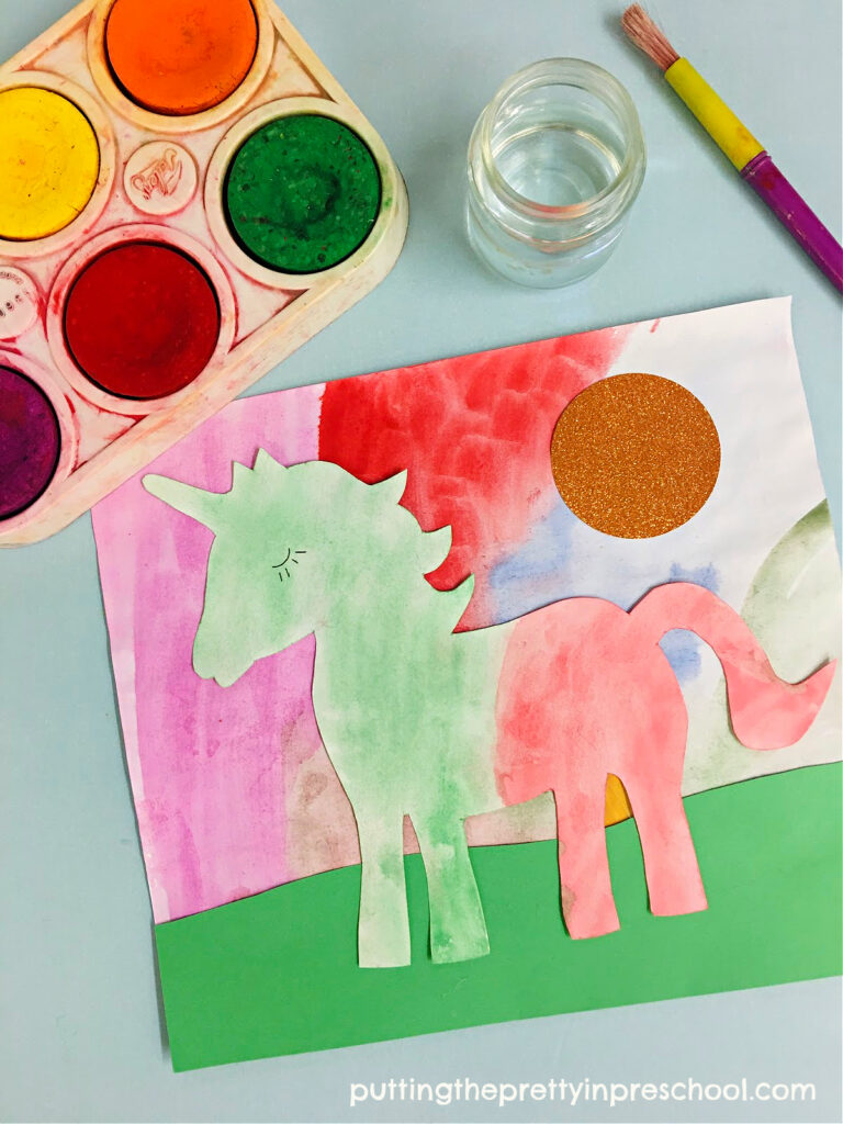 A stunning unicorn art project with tempera paint pucks and fadeless construction paper. Download a free unicorn template for the activity.