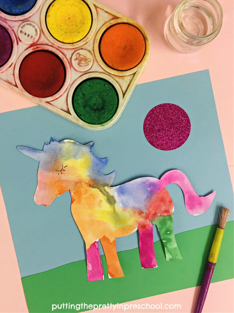 A stunning unicorn art project with tempera paint pucks and fadeless construction paper. Download a free unicorn template for the activity.