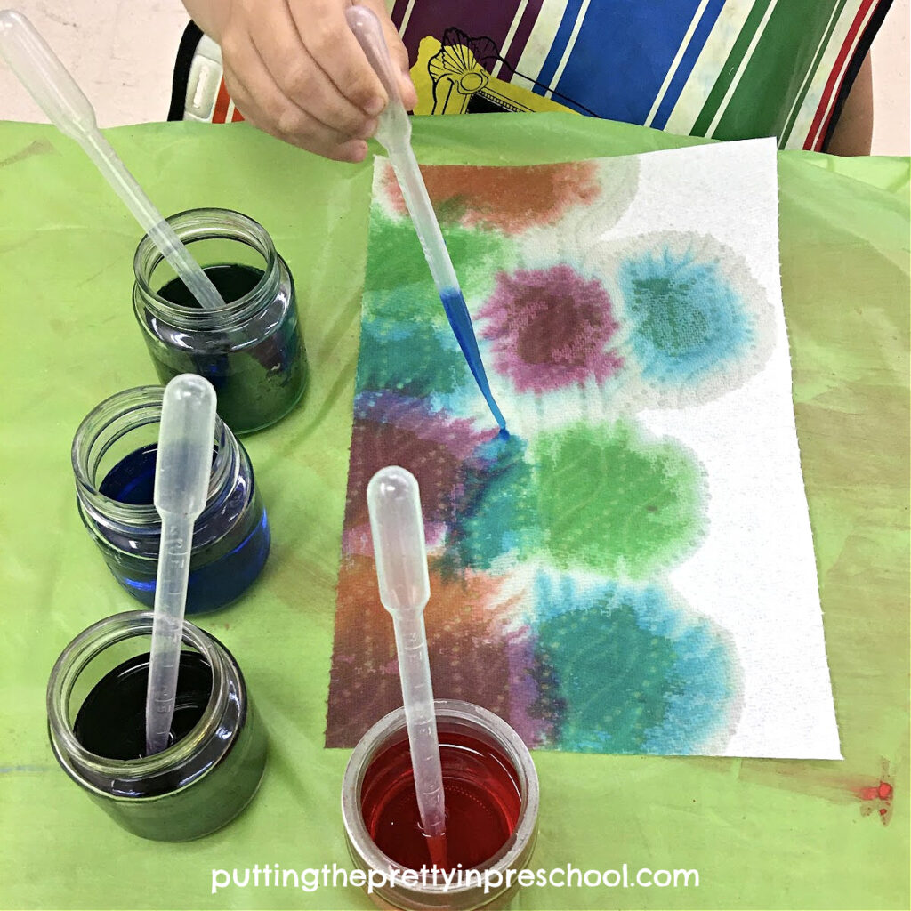 Create gorgeous eye dropper art with liquid watercolors on paper towle sheets. An all-ages process art activity.