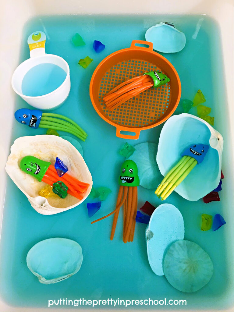 Include this easy-to-set-up jellyfish water play activity with dive toys, large shells, sand dollars, and acrylic gems in your next ocean theme.