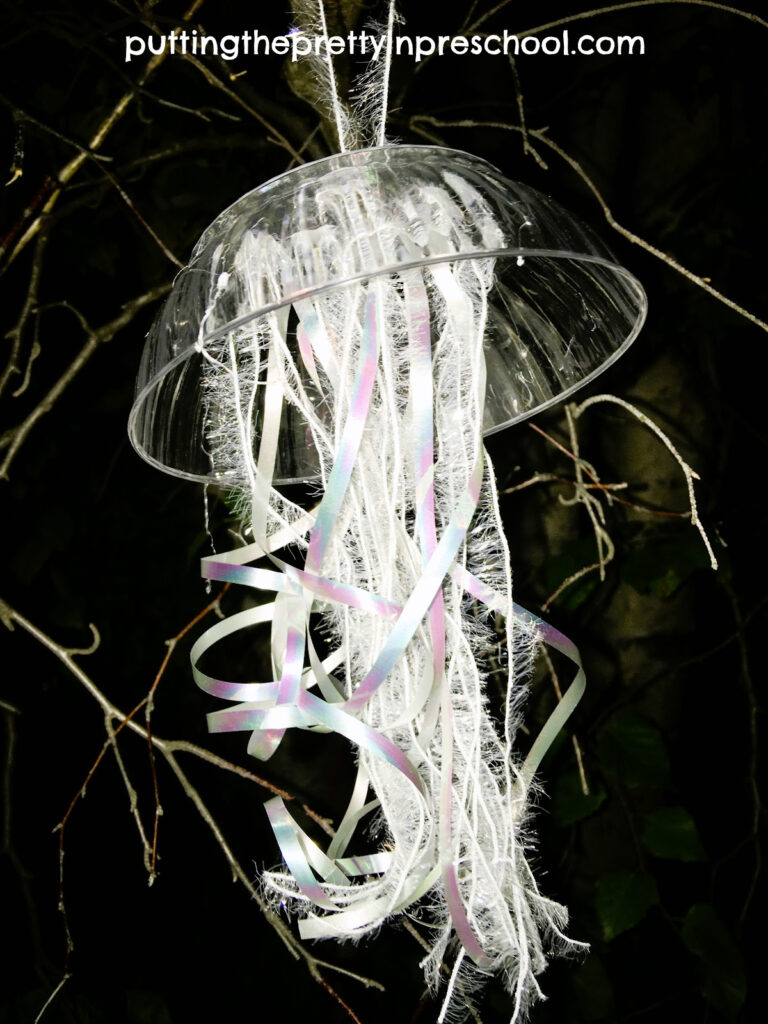 Design this hanging jellyfish craft using gorgeous, iridescent supplies. Displayed at night, it looks like a sea jelly floating in deep ocean waters.