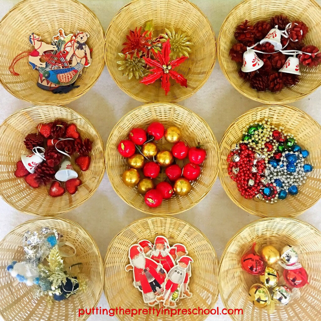 Baskets of child-friendly decorations for a Christmas tree decorating center.