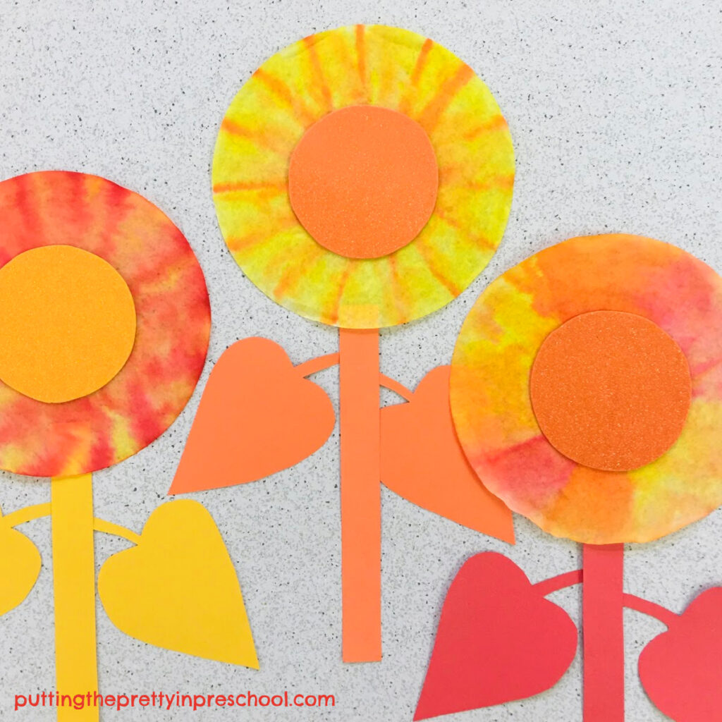 Felt pen-decorated coffee filter sunflowers that are easy to make.
