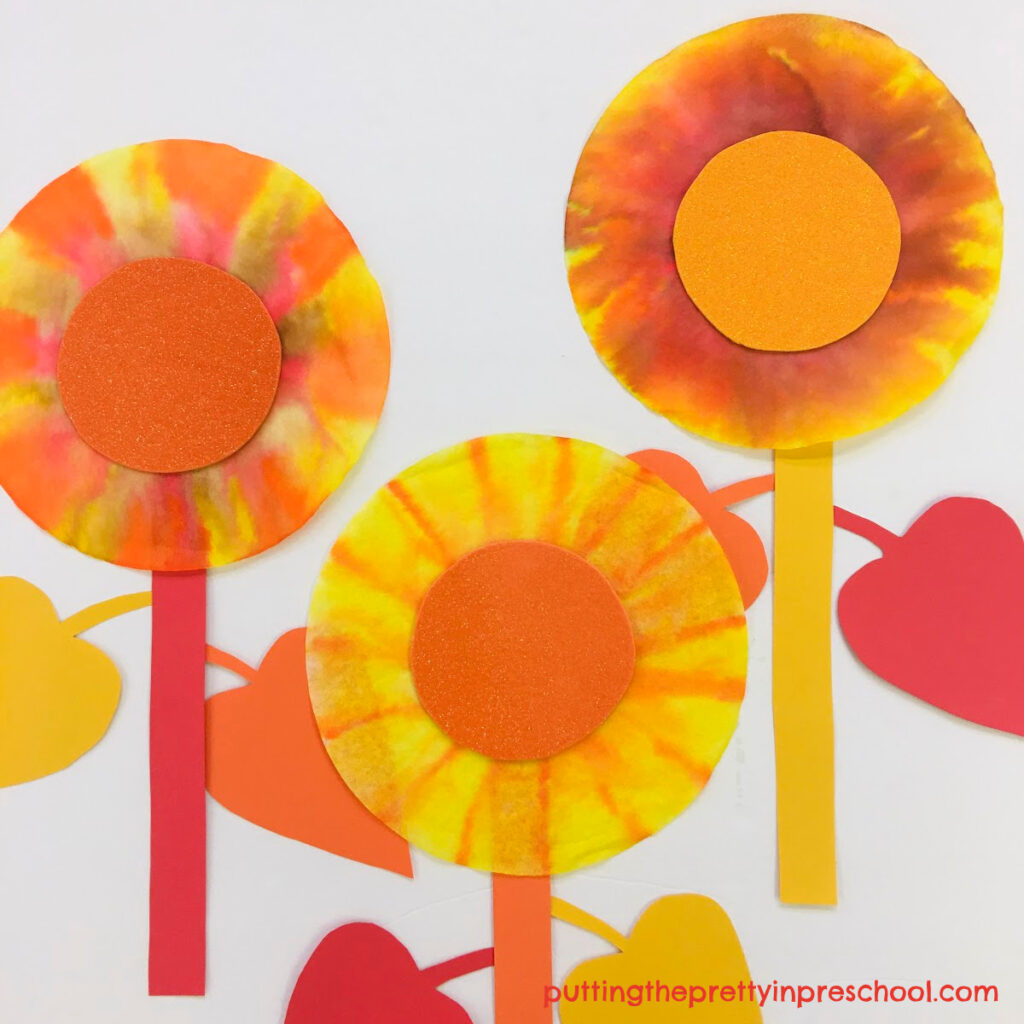 Bright sunflower art with felt pens and coffee filters.