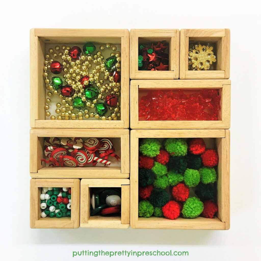 Seasonal loose parts are perfect to use with these see-through Christmas treasure blocks.