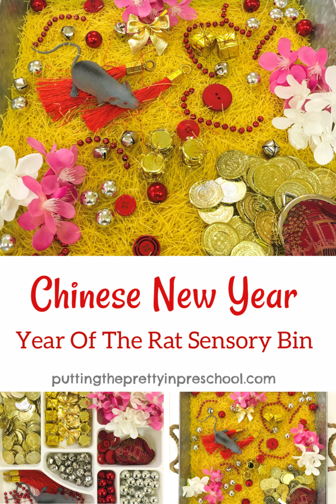 This bright and cheery Chinese New Year noodle bin has a "year of the rat" theme. A rat figurine takes center stage in the bin.