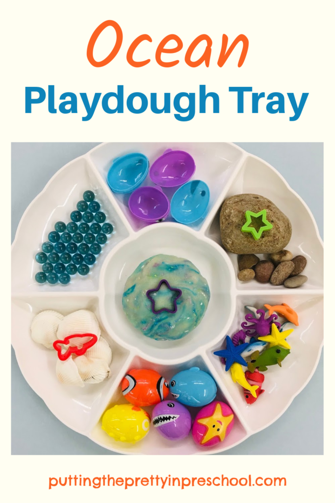 Your little learners will love this inviting ocean-themed playdough tray. Aquatic Easter eggs are the highlight of the tray.