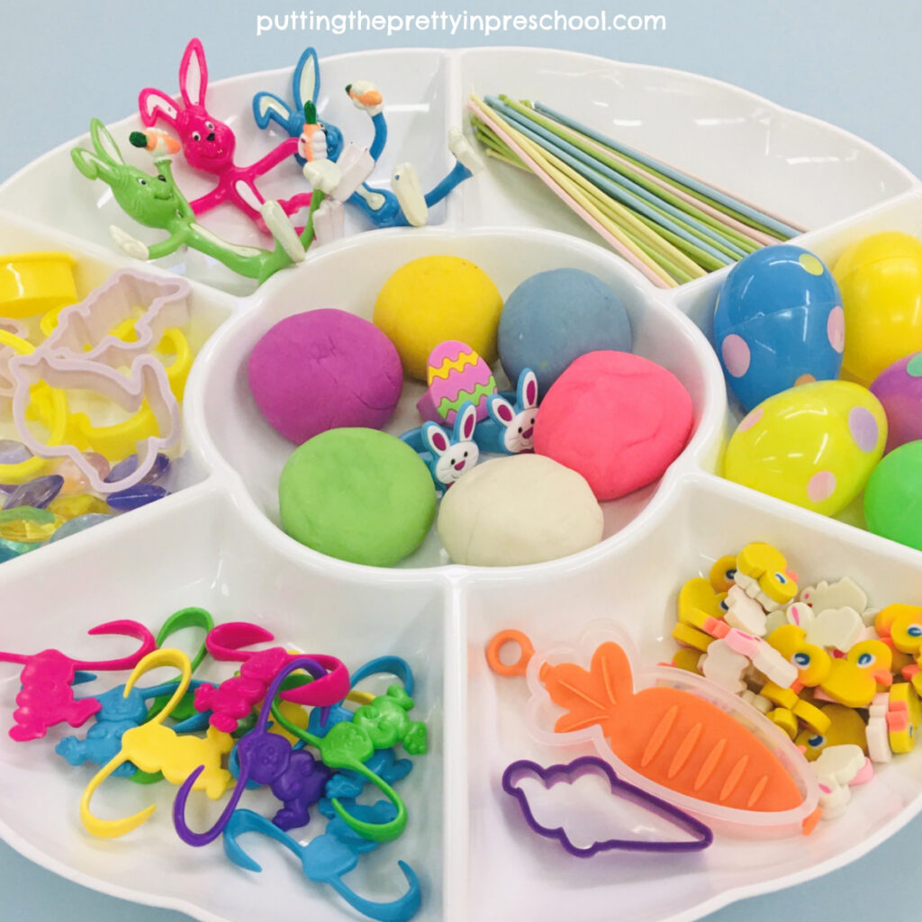 Colorful bunnies in all shapes and sizes are the highlight of this super fun Easter playdough tray.