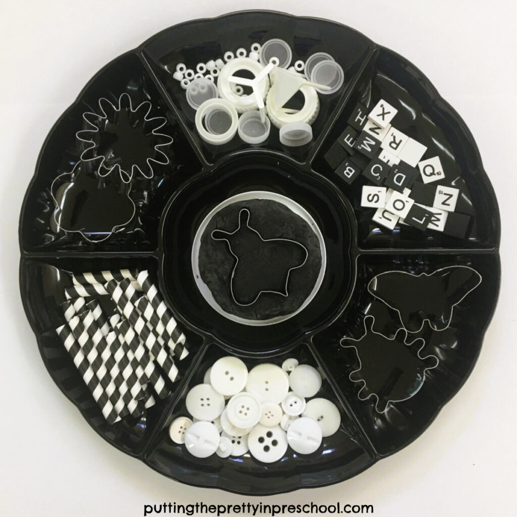 Set up this striking black and white playdough tray for your little learners to explore today!