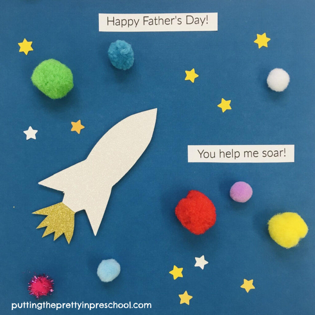 An easy-to-make Father's Day craft. A glittery spaceship and pompom planets are the highlights of the craft.