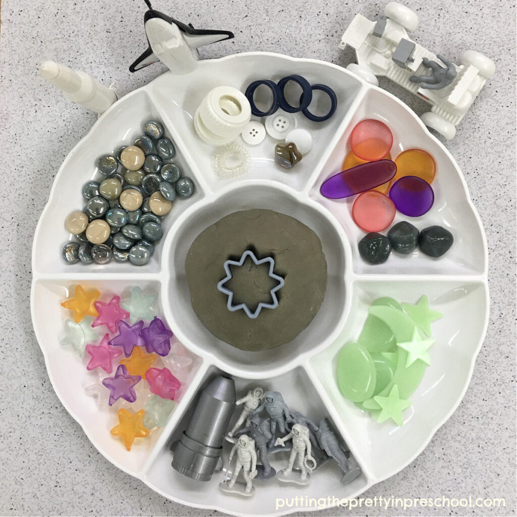 Your child will love to explore space with this moon playdough tray. The homemade playdough is amazing!