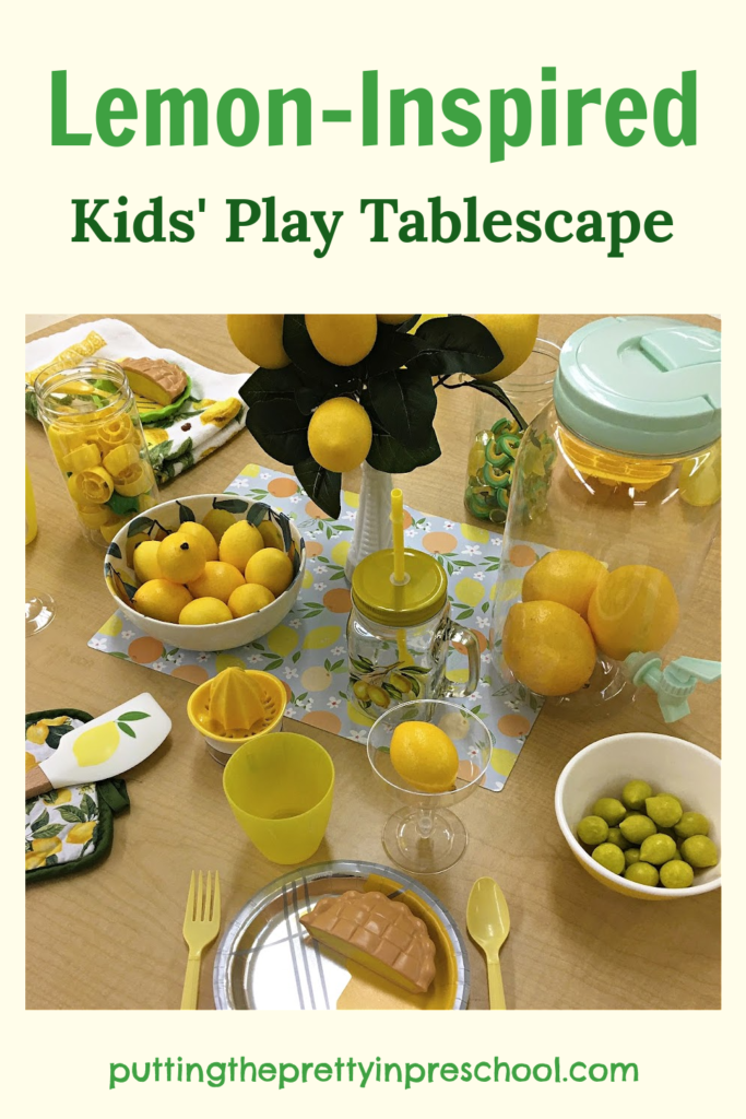 This lemon-inspired kids' play tablescape can be set up any time of the year. Loose parts complement the lemon theme.