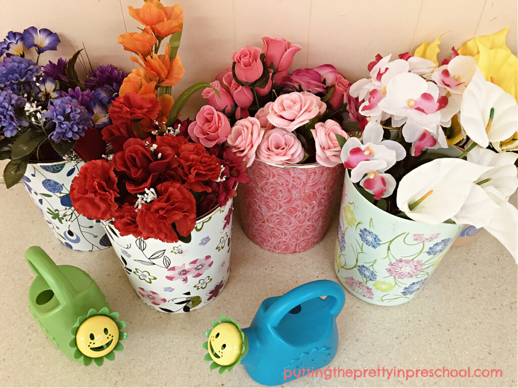 Color sorting artificial flowers in a flower stand dramatic play center is a good way to learn about colors.
