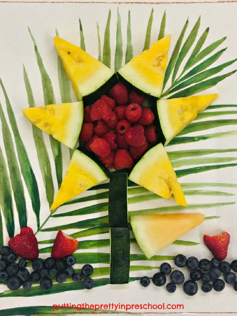 Make this sunflower-shaped snack with yellow and orange watermelon and raspberries. Add strawberries and blueberries for garnish.